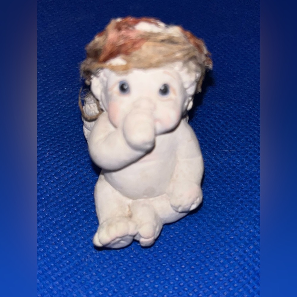 Dreamsicles Cherub: sucking thumb